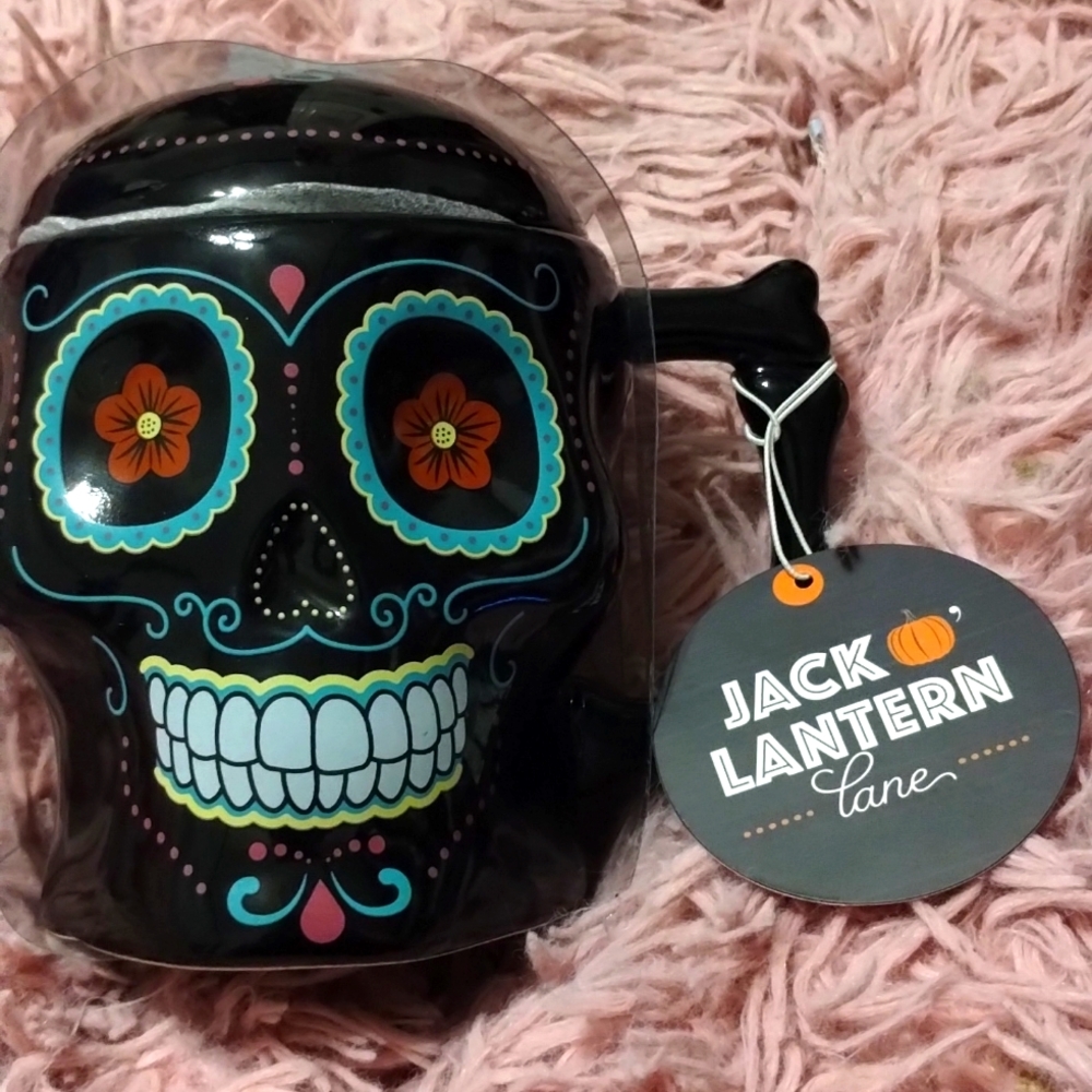 Skull shaped and decorated mug